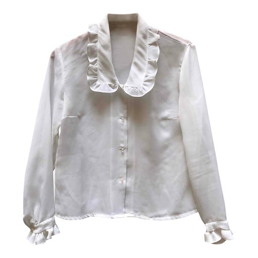 Blouse with ruffles on the collar and sleeves