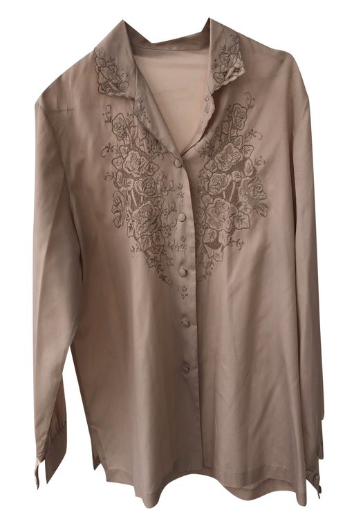 Taupe / nude shirt with pretty embroidery.