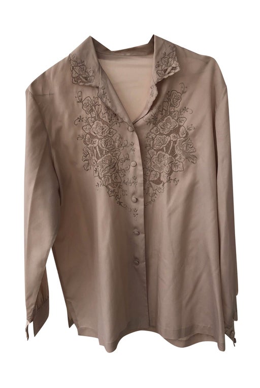 Taupe / nude shirt with pretty embroidery.