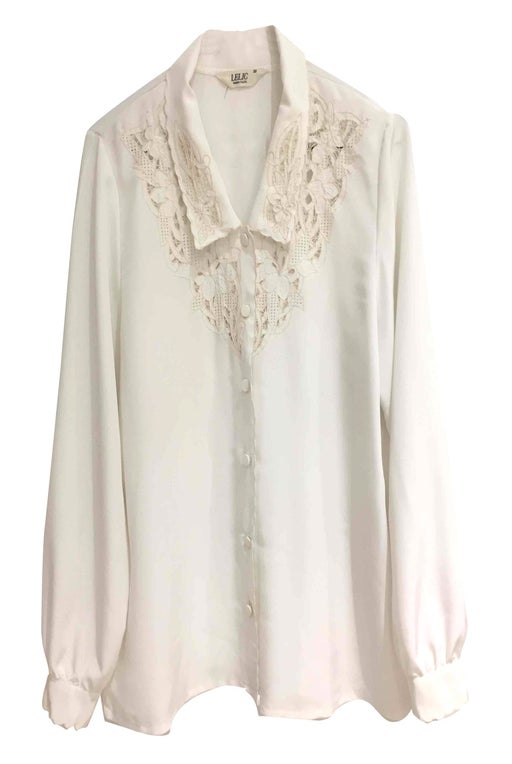 Synthetic white blouse embroidered with f