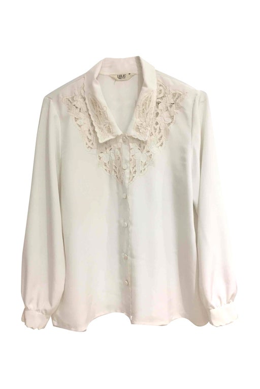 Synthetic white blouse embroidered with f