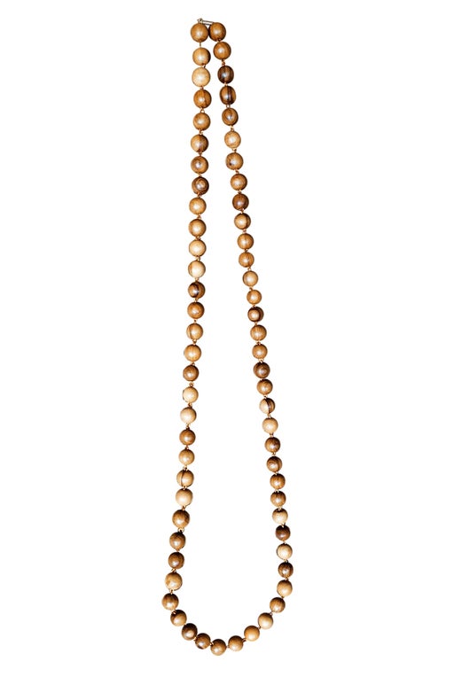 Long necklace of round olive wood beads