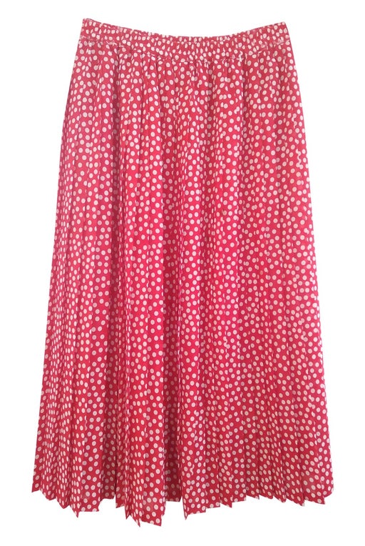 red pleated midi skirt with white polka dots