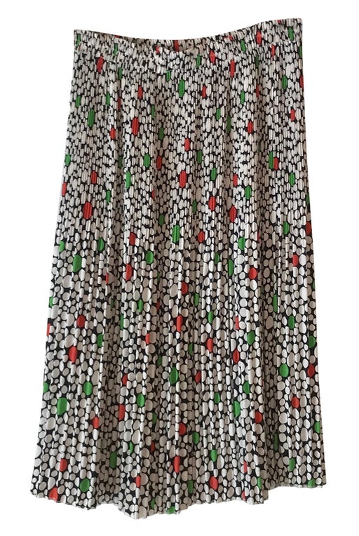Pleated skirt with white, green and red polka dots