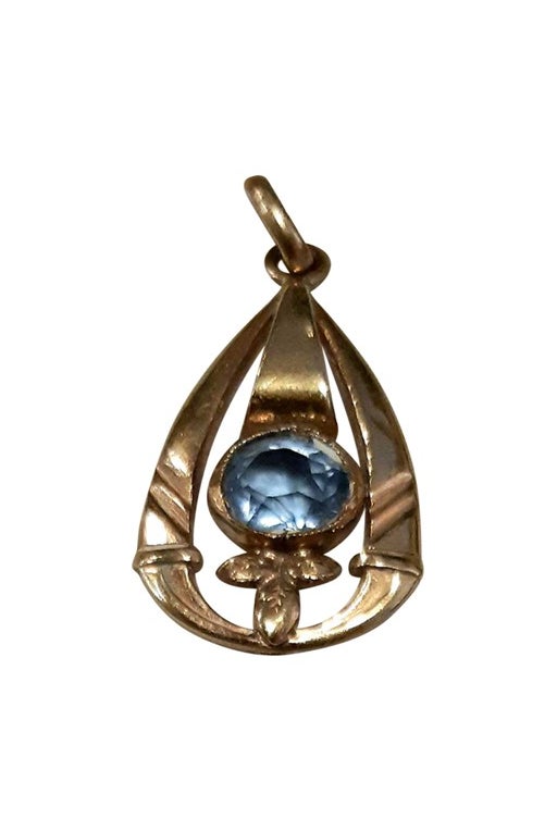 Gold plated pendant, blue crystal ci