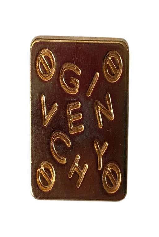 Square Givenchy pins in gold metal