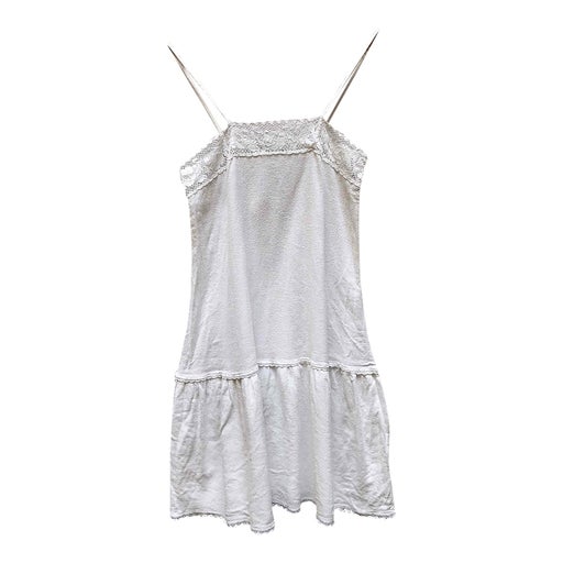 White mini dress with thin straps in