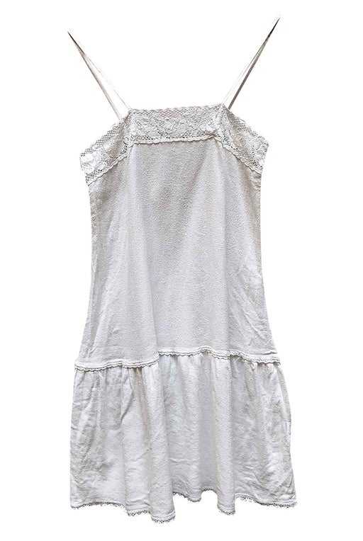 White mini dress with thin straps in