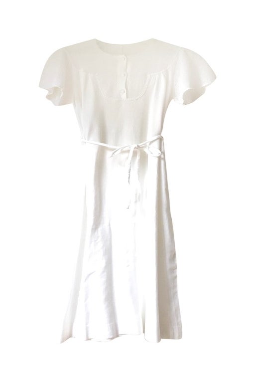 Long romantic dress in white cotton,