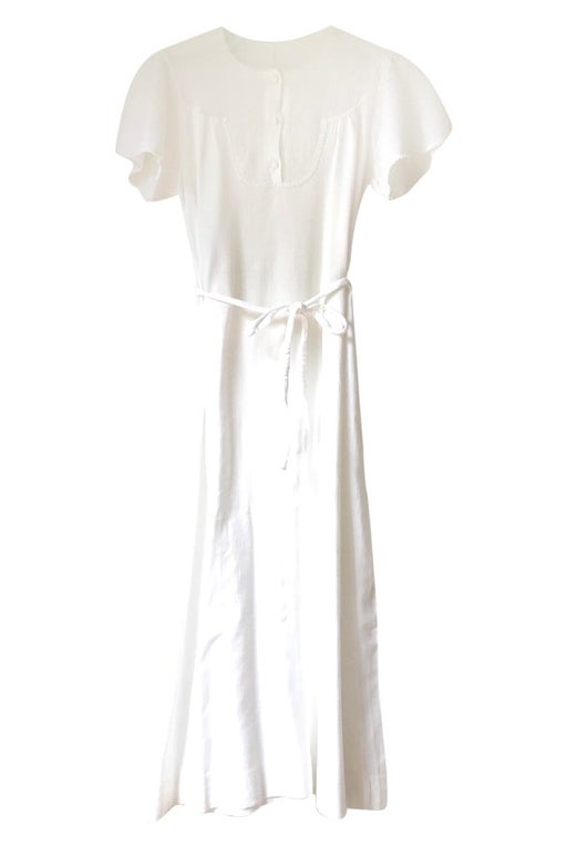 Long romantic dress in white cotton,