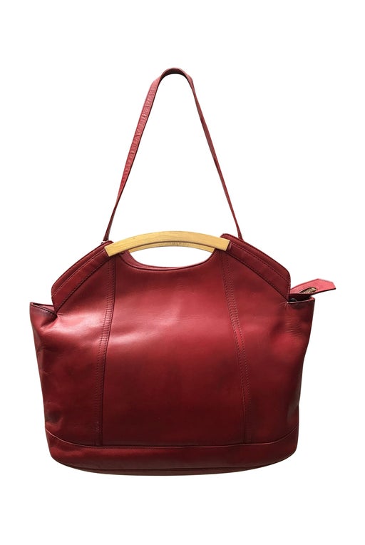 Red leather bag with a shoulder strap,