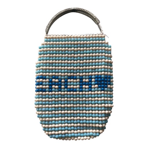 White and blue pearl bag with inscriptio