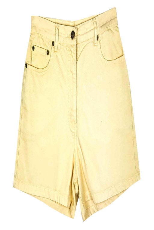High waisted denim shorts, pastel yellow