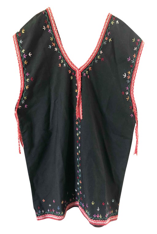 Top with small flower embroidery.