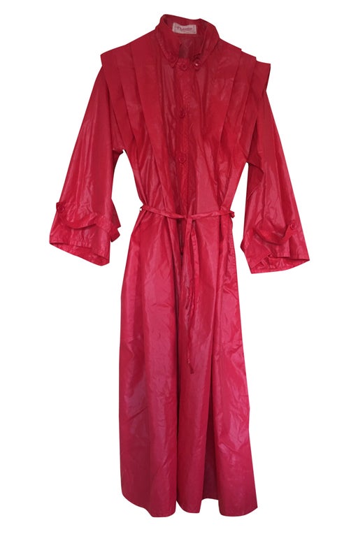 glossy red nylon trench coat Miss Ph
