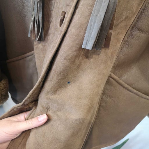 Manteau en peau lainée