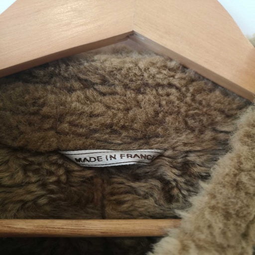 Manteau en peau lainée