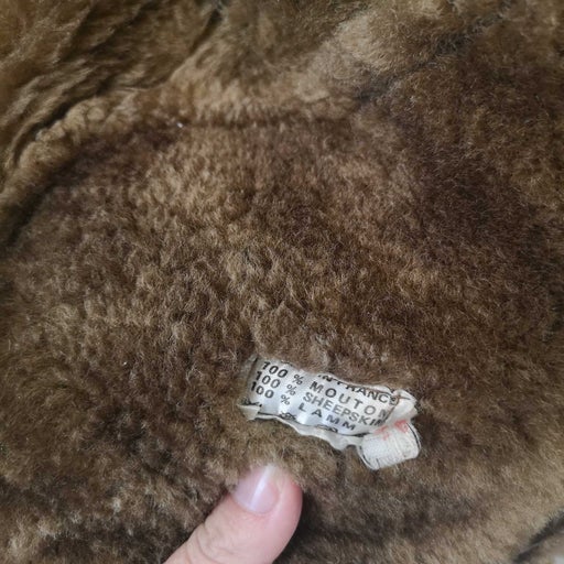 Manteau en peau lainée