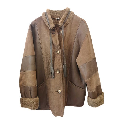Manteau en peau lainée