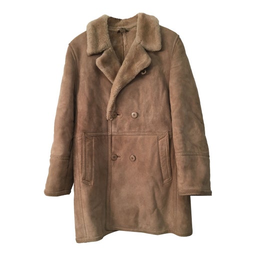 Manteau en peau lainée