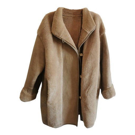 Manteau en peau lainée