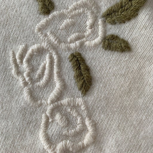 Embroidered turtleneck