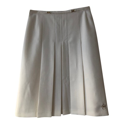 Pleated skirt with golden belt