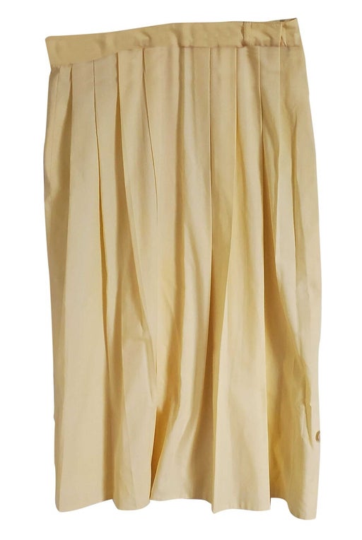 Yellow pleated skirt