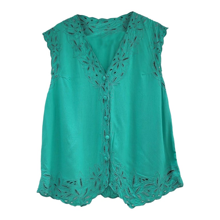 Top brodé turquoise