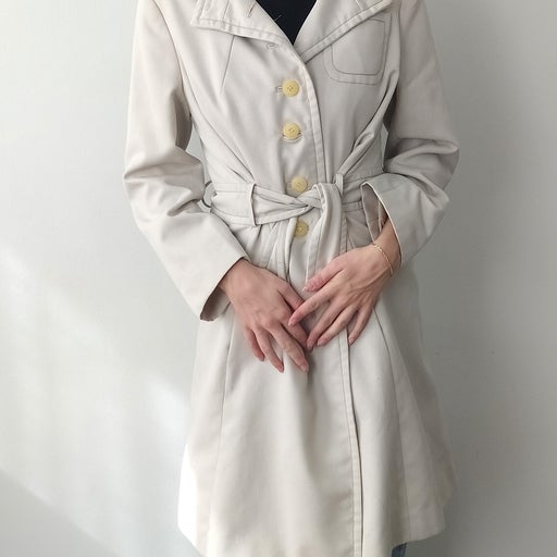 Belted gray trench coat