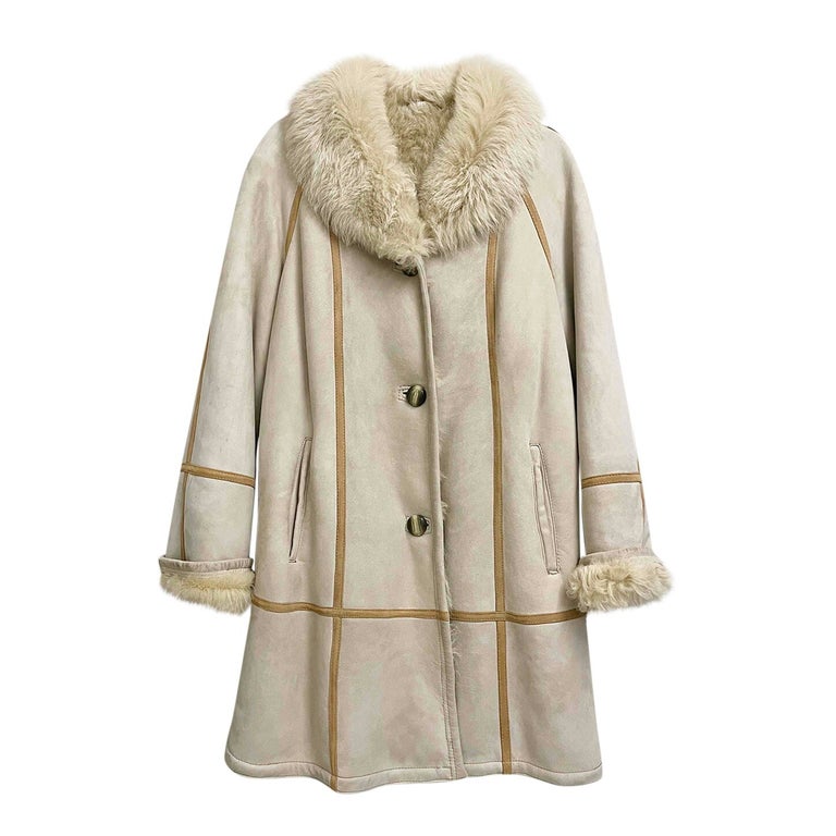 Manteau en peau lainée