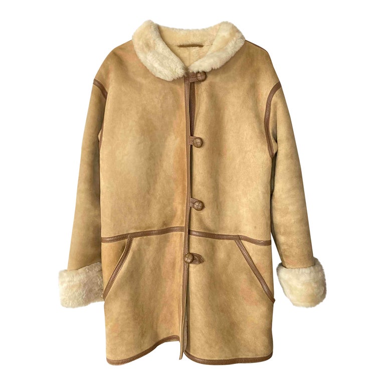 Manteau en peau lainée
