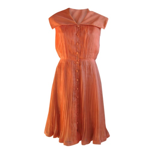 Orange pleated dress