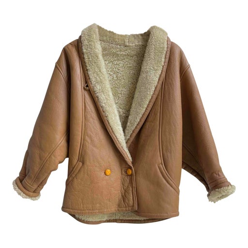 Manteau en peau lainée