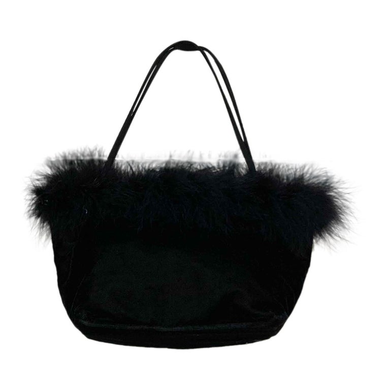 Sac en velours et plumes