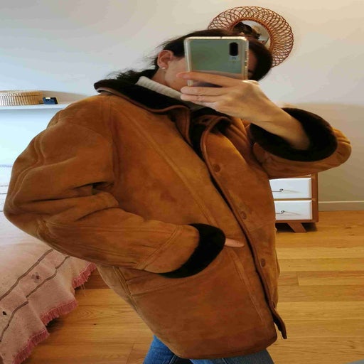 Manteau en peau lainée