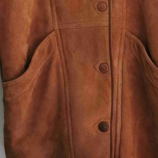 Manteau en peau lainée