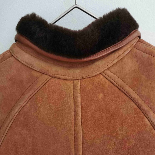Manteau en peau lainée