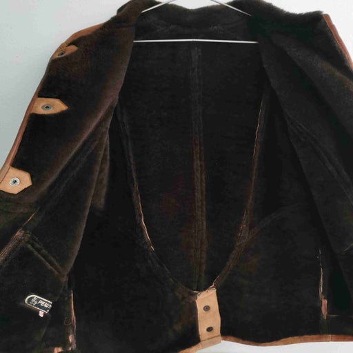 Manteau en peau lainée