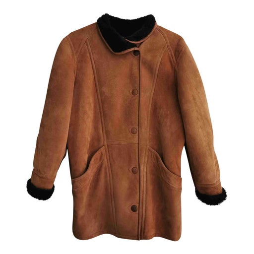 Manteau en peau lainée