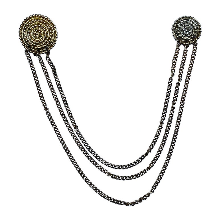 Broche asymétrique dorée
