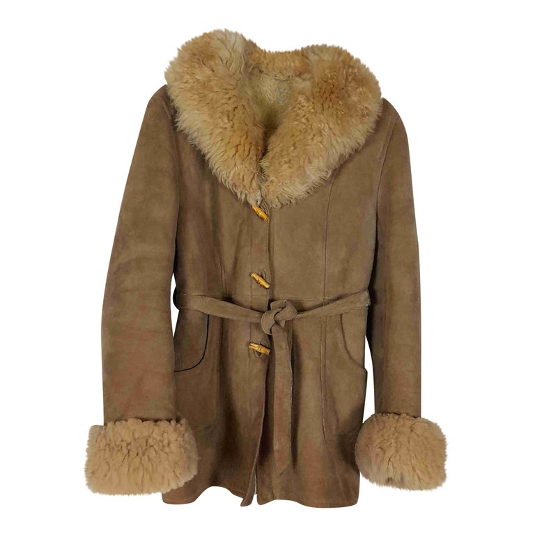 Manteau en peau lainée