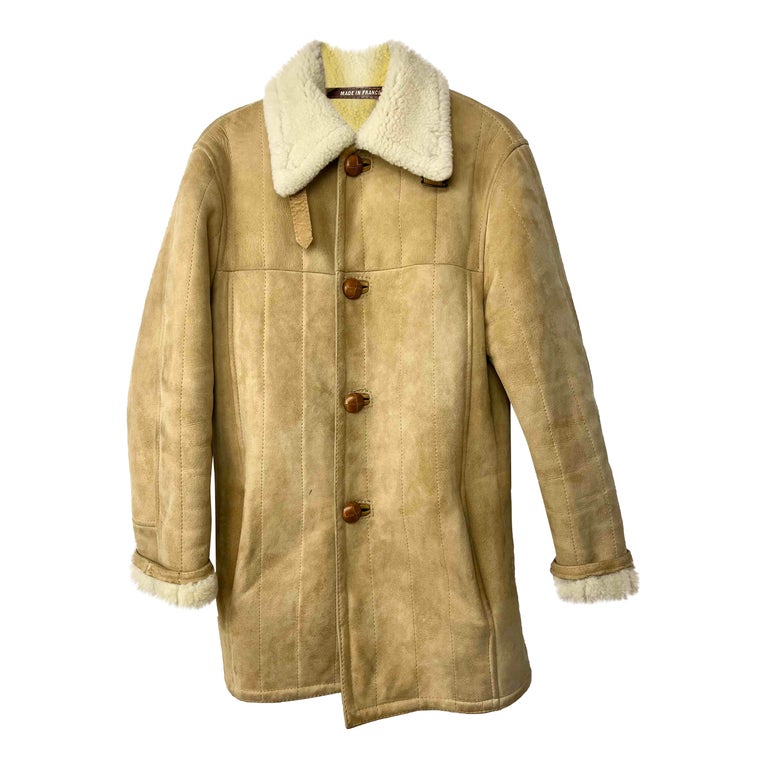 Manteau en peau lainée