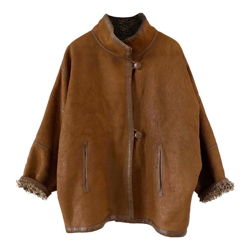 Manteau en peau lainée