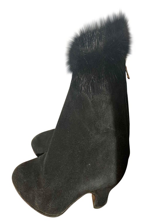 Boots in suede and fur