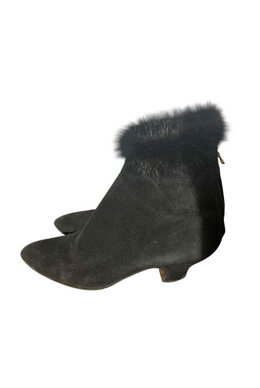 Boots in suede and fur