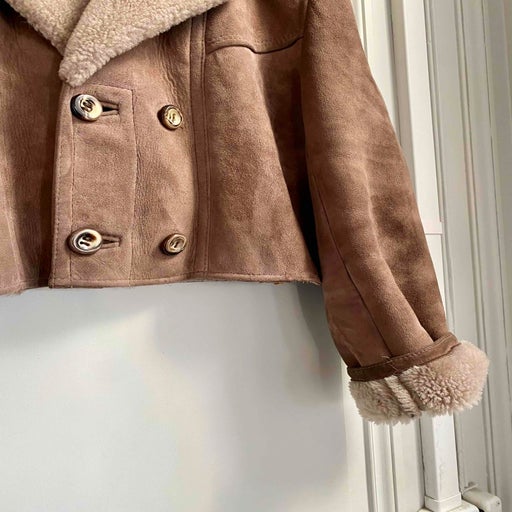 Manteau en peau lainée