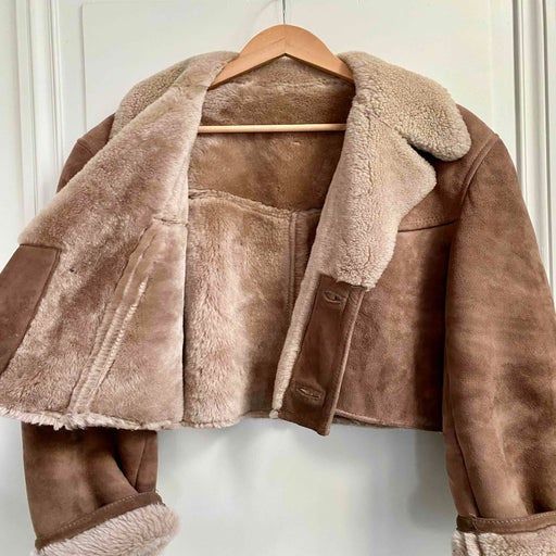 Manteau en peau lainée