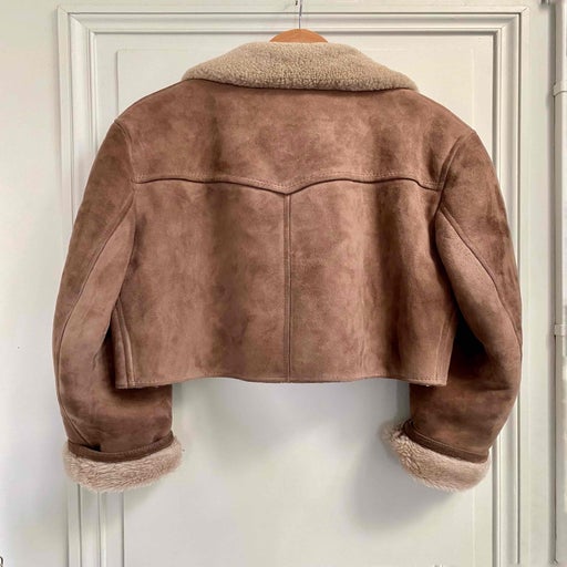 Manteau en peau lainée