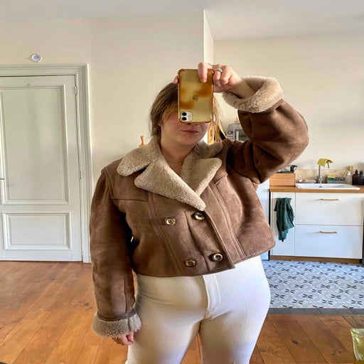 Manteau en peau lainée